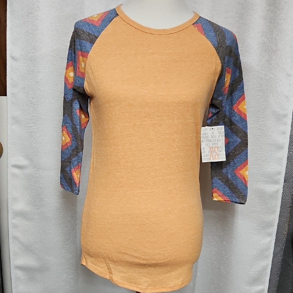 LuLaRoe Randy Tee Raglan Top with Geometric Print Sleeves Shirt